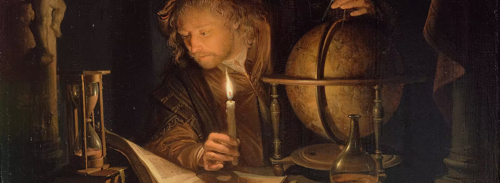 Astronomer by Candlelight — a scholar reading by a single flame, globe and hourglass at hand, by Gerrit Dou